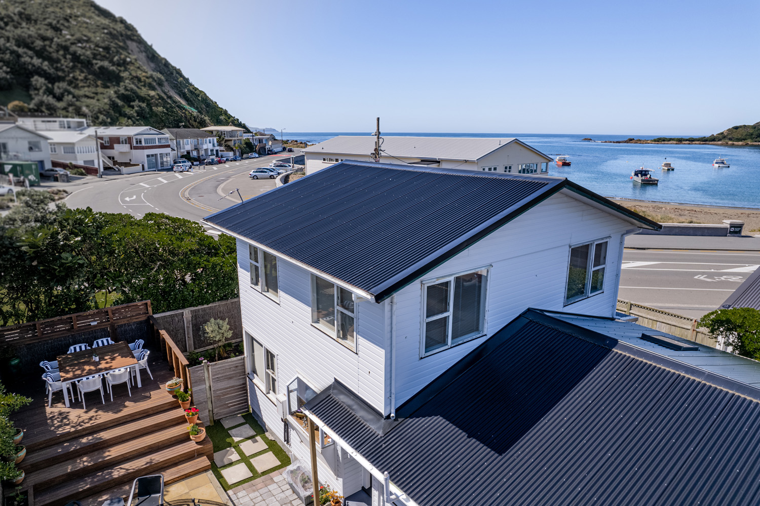 Low aerial shot of a roof in Island Bay
